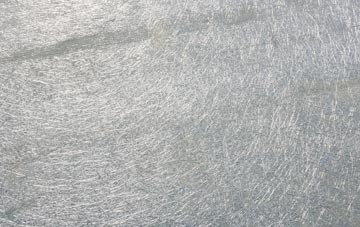 Kibbear laminate fibreglass or shingles?